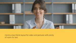 A woman in a white shirt smiling and gesturing with her hands, standing in an office with bookshelves in the background, creating content with Biteable video maker.