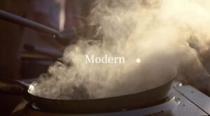A close-up of a frying pan with steam rising, partially obscuring the view, and the word "Modern" centered in white text—perfect for a sleek restaurant ad video template.