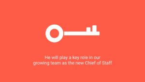 A white key icon on a vibrant orange background with text stating "he will play a key role in our growing team as the new chief of staff," created using Biteable video maker.