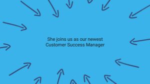 Text "she joins us as our newest customer success manager" centered on a blue background with multiple white arrows pointing towards the text, created using Biteable video maker.