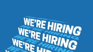3D text displaying 'we're hiring' repeated on a staircase design against a solid blue background, created using Biteable video maker.