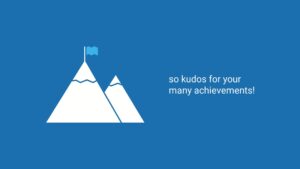 Illustration of two white mountain peaks with a flag on one, against a blue background, accompanied by text "so kudos for your many achievements!", created with Biteable video maker.